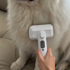 Deshedding brush head on a long coat