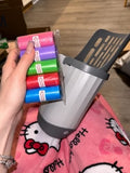 The scoop with its five free bag rolls, straight out of the box